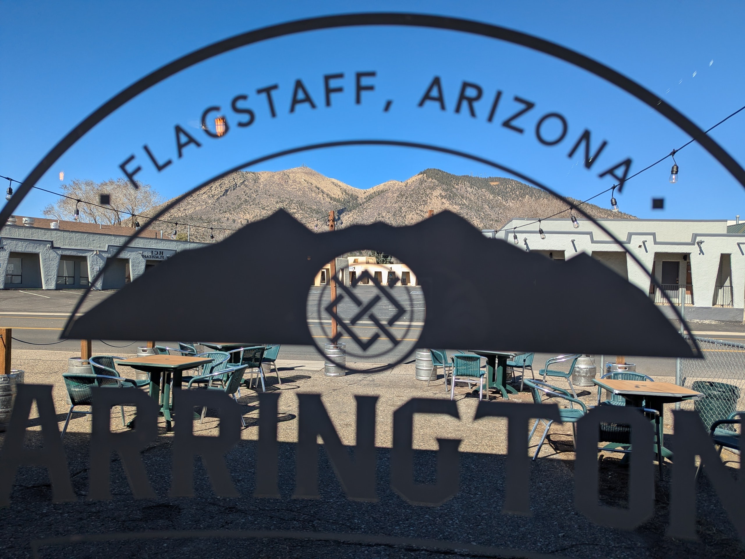Photo of mount elden through the window at Harrington's Tap House