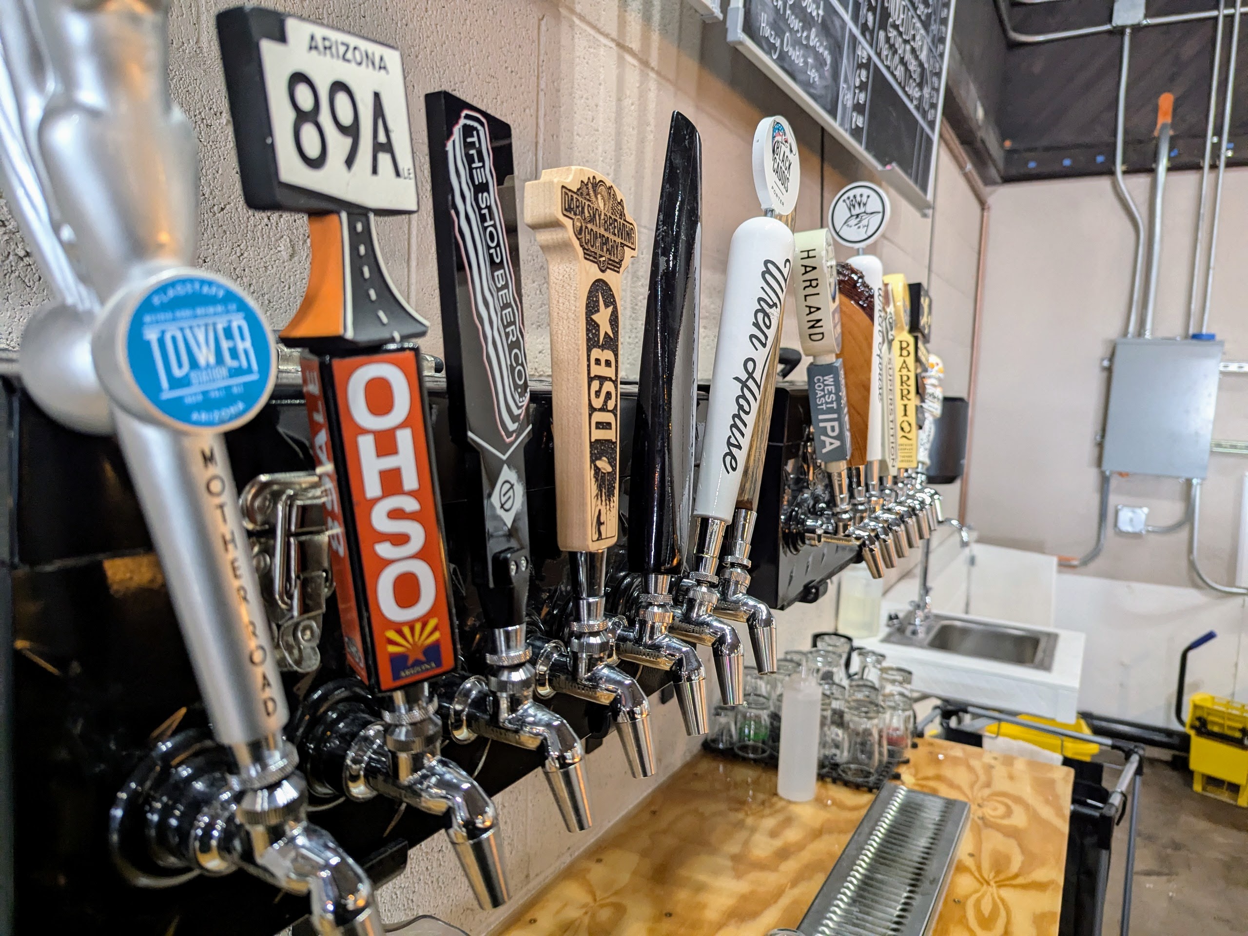 Photo of tap handles at Harrington's Tap House